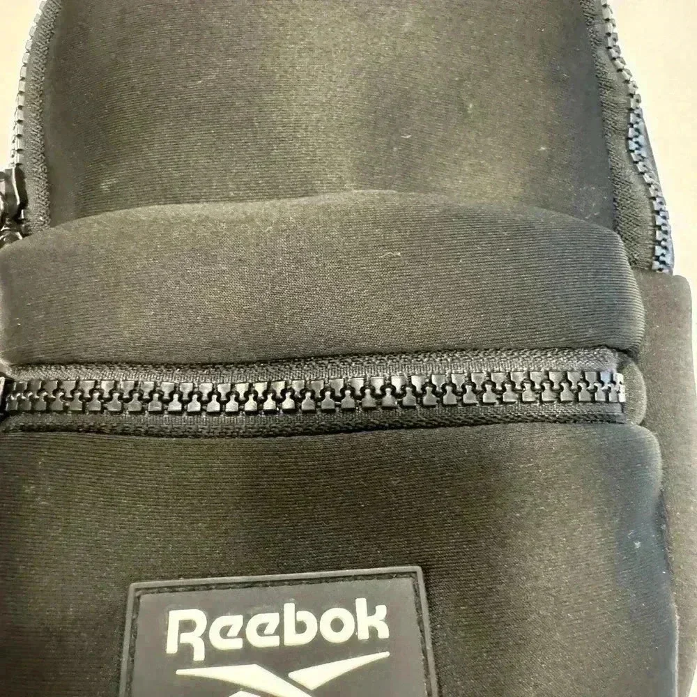 Reebok mini neoprene back pack adjustable straps front zip compartment